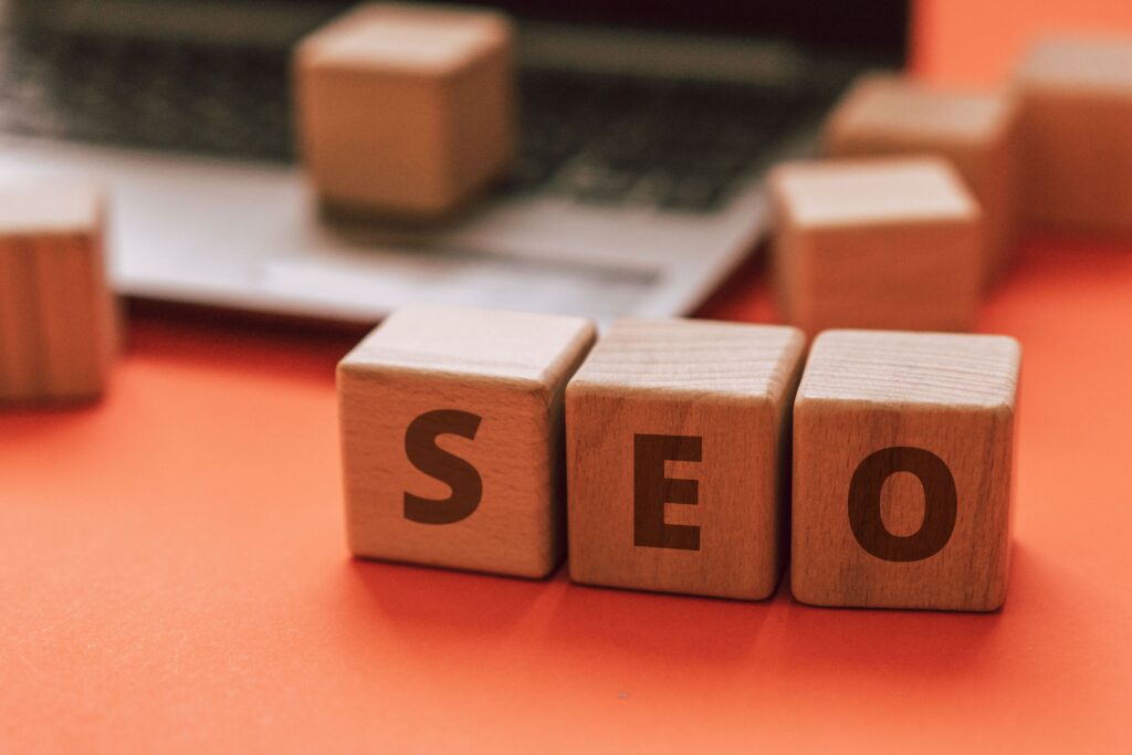 SEO wooden blocks on laptop